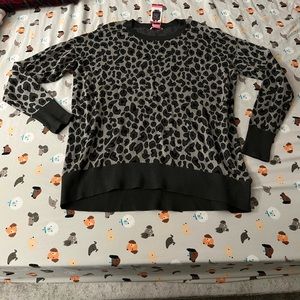 Woman’s cheetah sweater